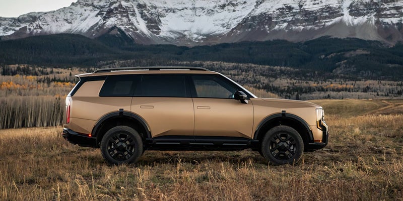 2027 Kia Telluride parked in a field.